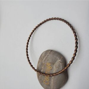 Copper gold‎ toned twist bracelet
